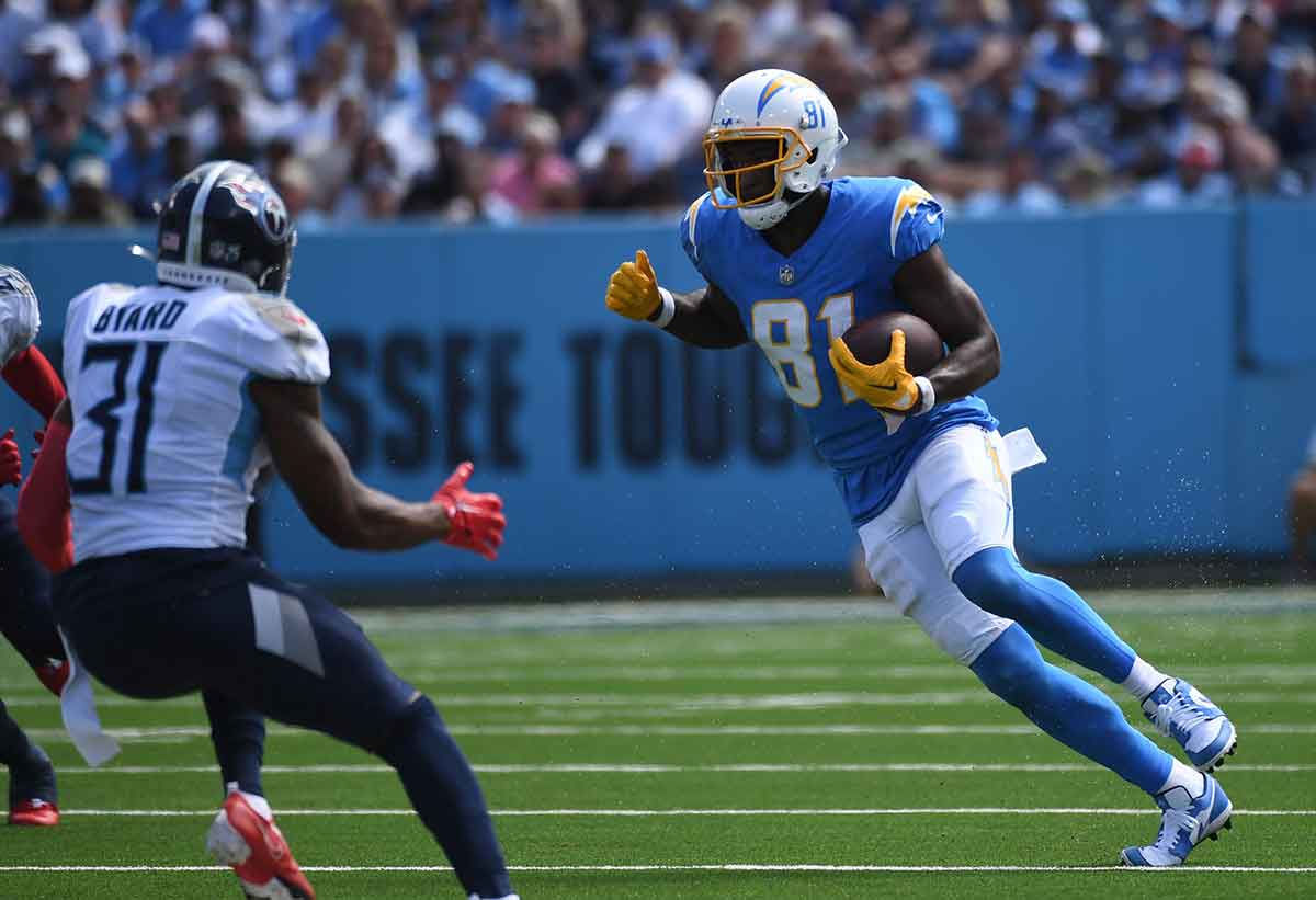 Los Angeles Chargers wide receiver Mike Williams (81) runs after a catch during the first half against the Tennessee Titans at Nissan Stadium.