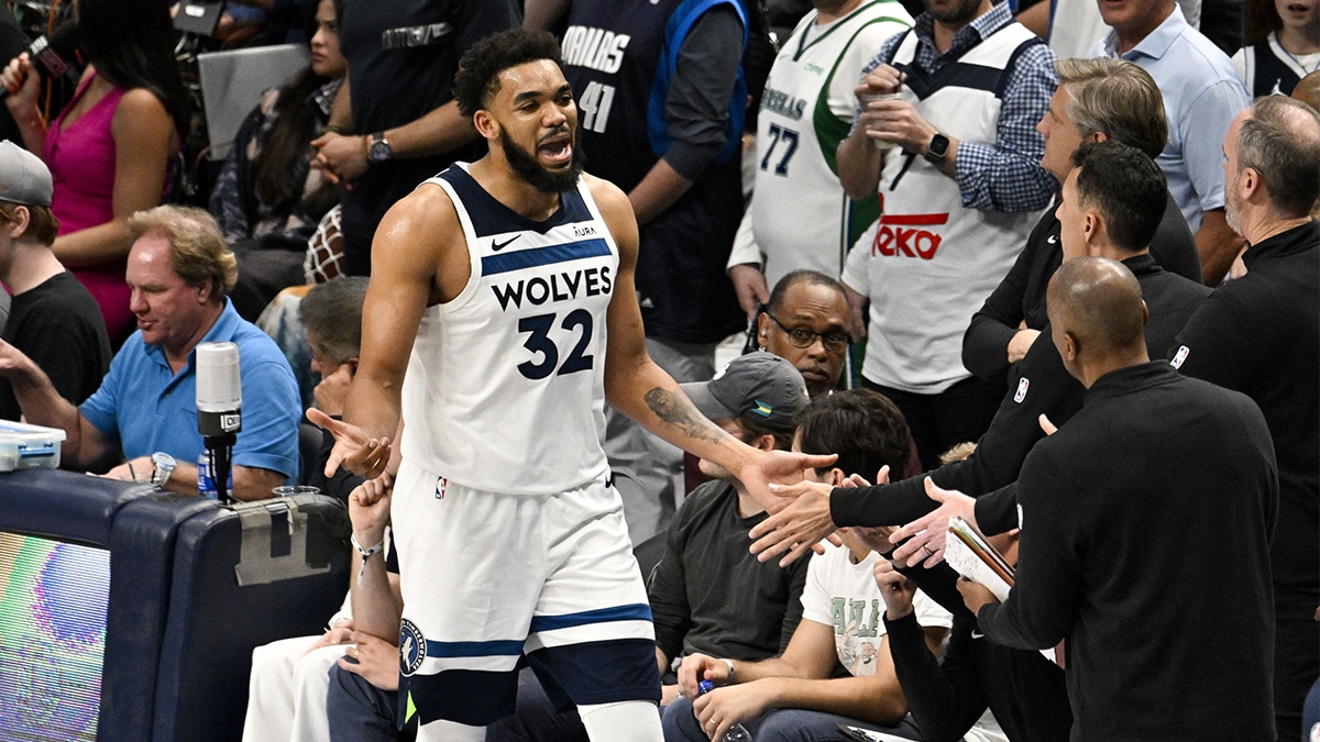 Minnesota Timberwolves center Karl-Anthony Towns (32) fouls out against the Dallas Mavericks during the second half in game four of the western conference finals for the 2024 NBA playoffs at American Airlines Center.