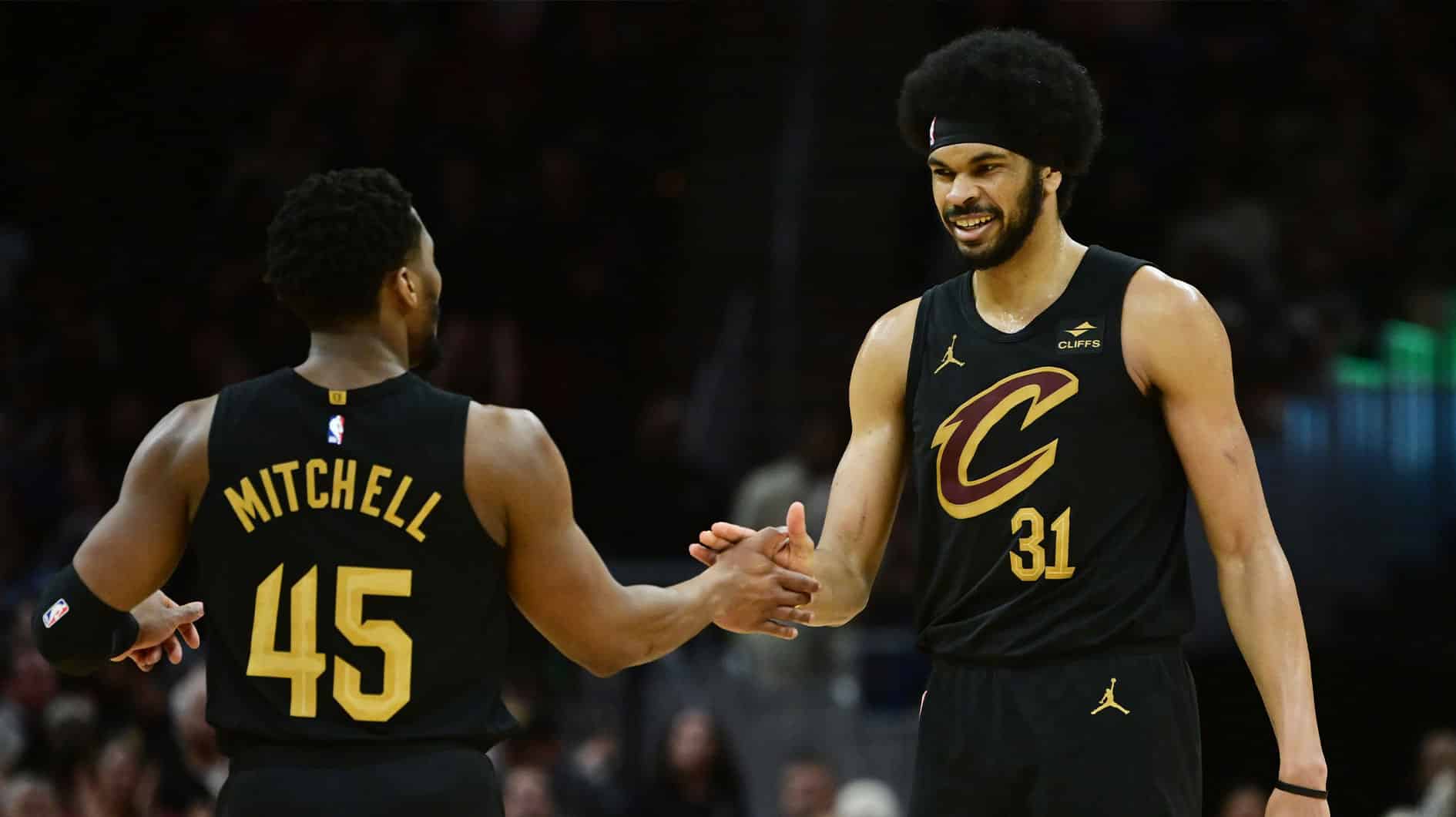 Cleveland Cavaliers guard Donovan Mitchell (45) and center Jarrett Allen (31) celebrate during the second half against the Memphis Grizzlies at Rocket Mortgage FieldHouse