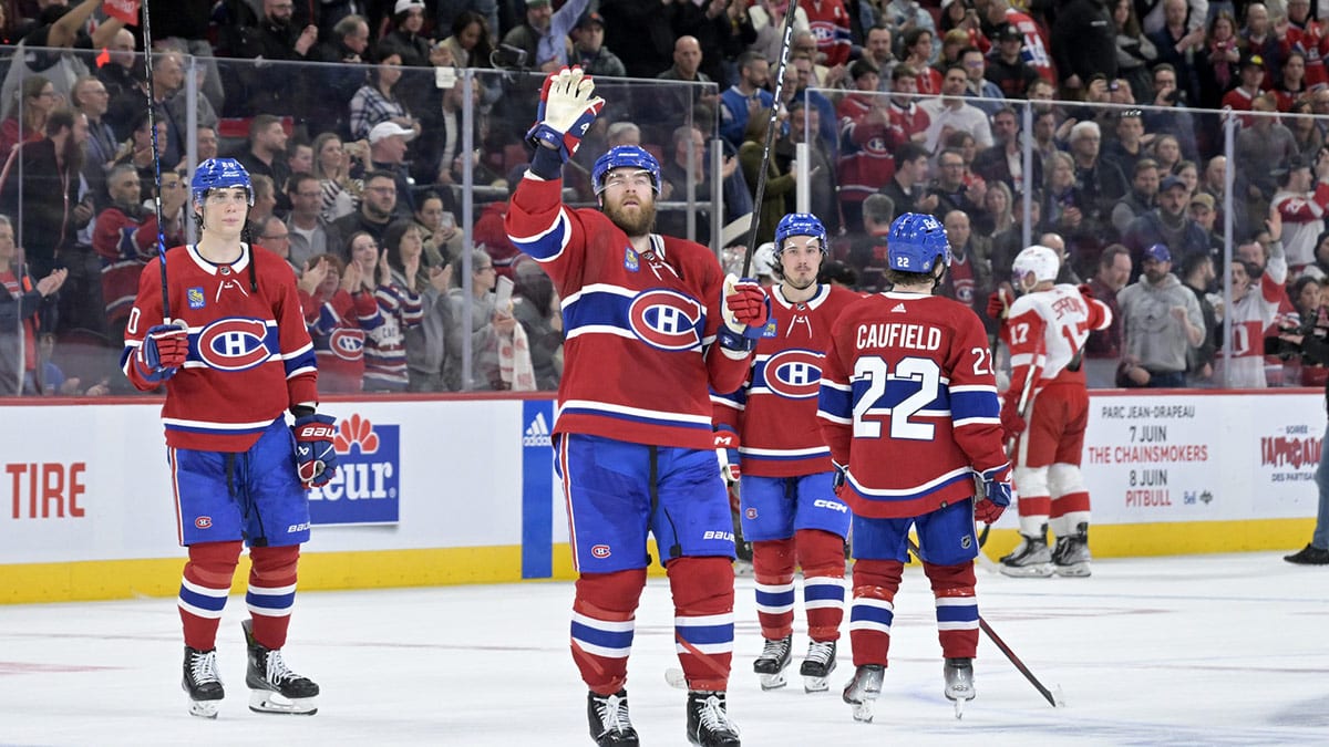 Montreal Canadiens defenseman David Savard (58) and teammates salute the crowd after a game against the Detroit Red Wings at the Bell Centre.