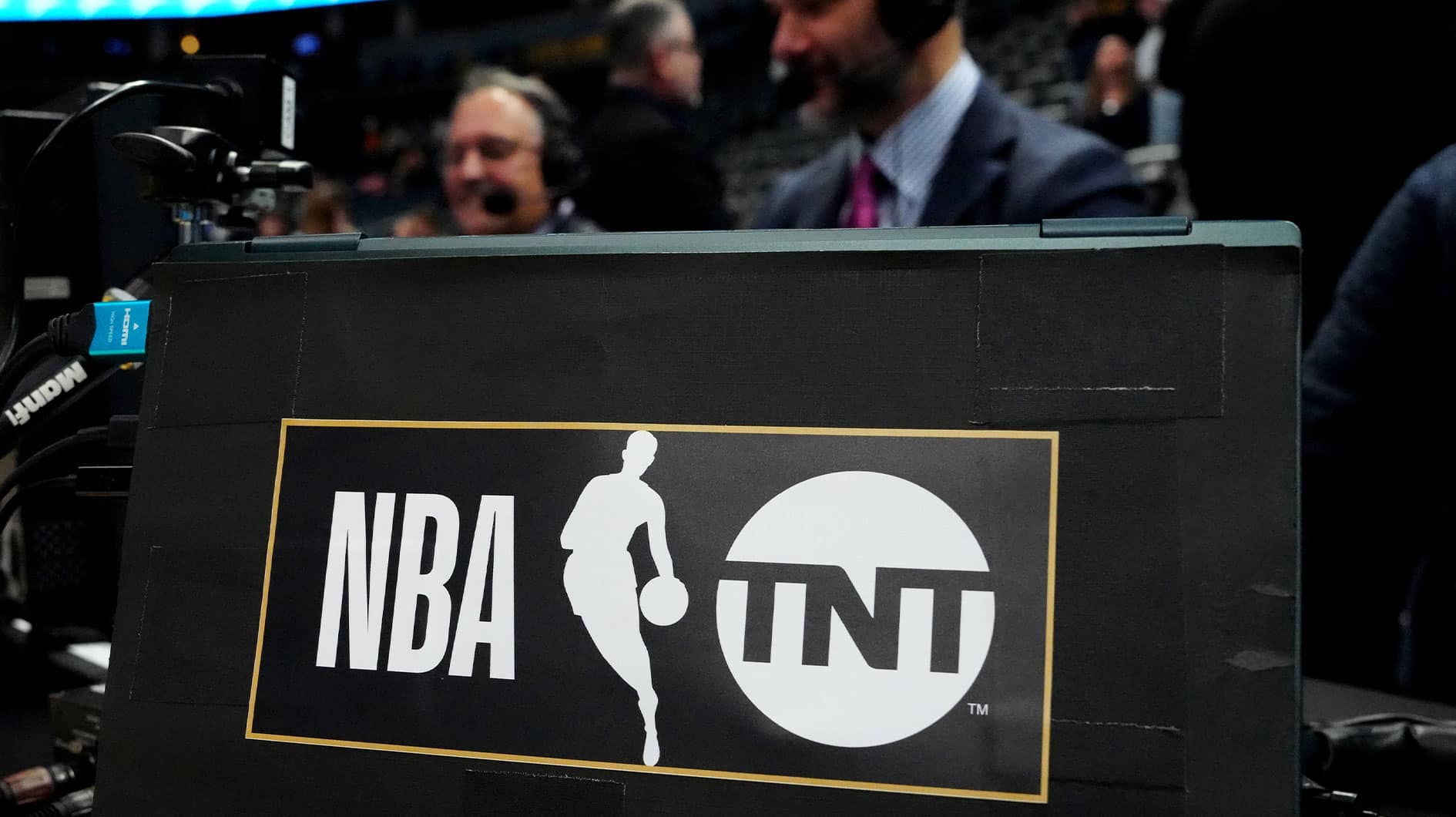 A general view of a NBA on TNT logo on the broadcast table before the game between the New Orleans Pelicans against the Denver Nuggets at Ball Arena.