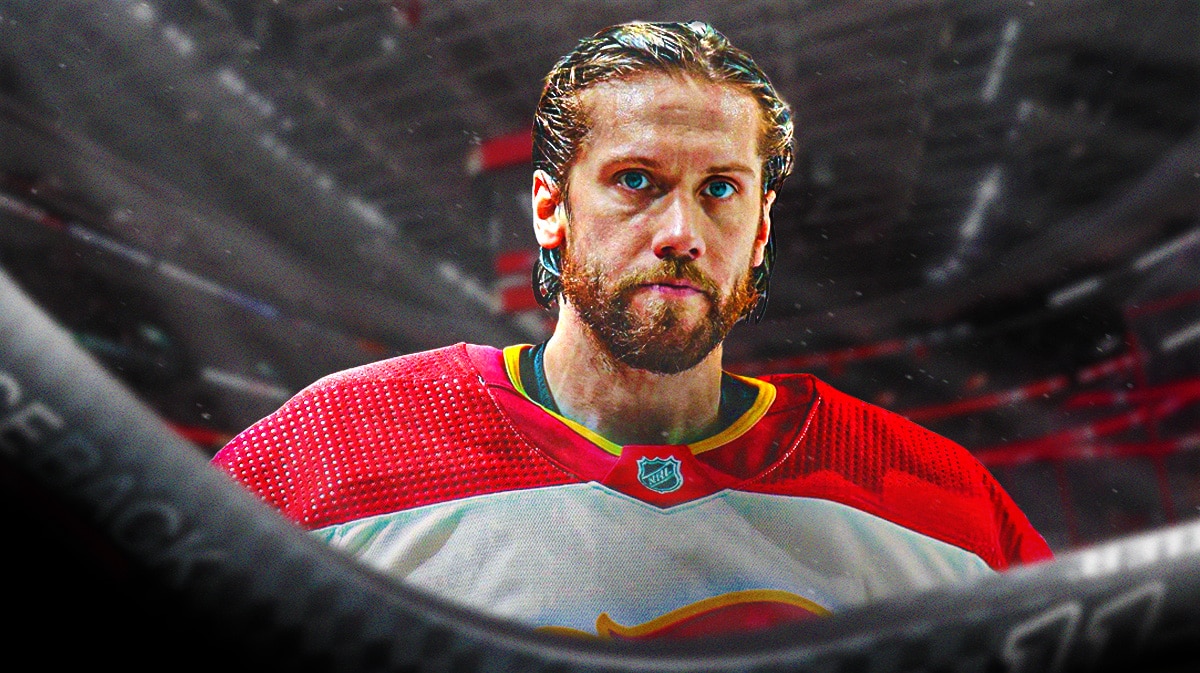Flames goaltender Jacob Markstrom with Senators arena behind.