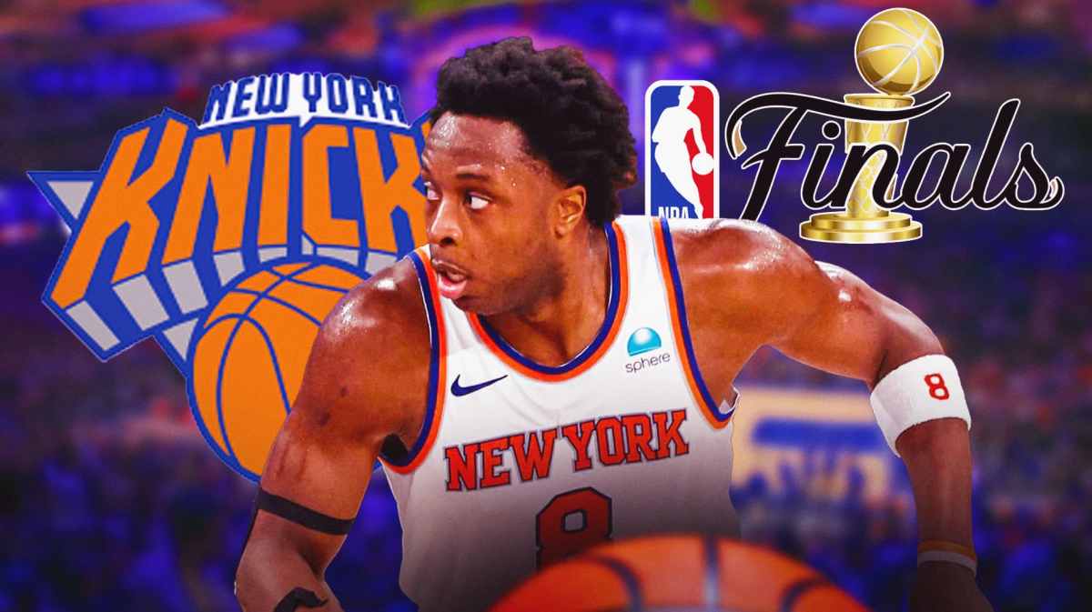 Knicks' OG Anunoby stands next to NBA Finals logo after contract move, Mikal Bridges in background