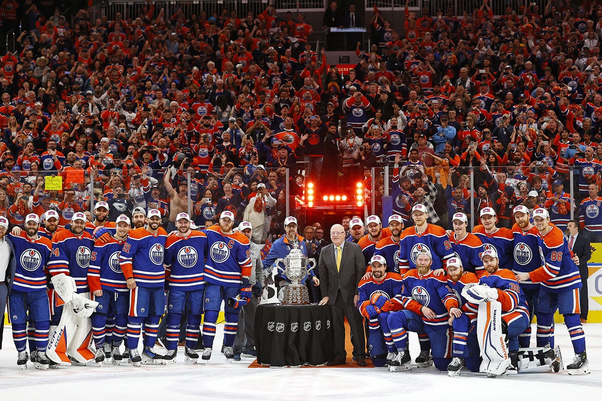 The Edmonton Oilers pose with the Campbell Conference Bowl after winning the Western Conference Championship in game six of the Western Conference Final of the 2024 Stanley Cup Playoffs at Rogers Place.