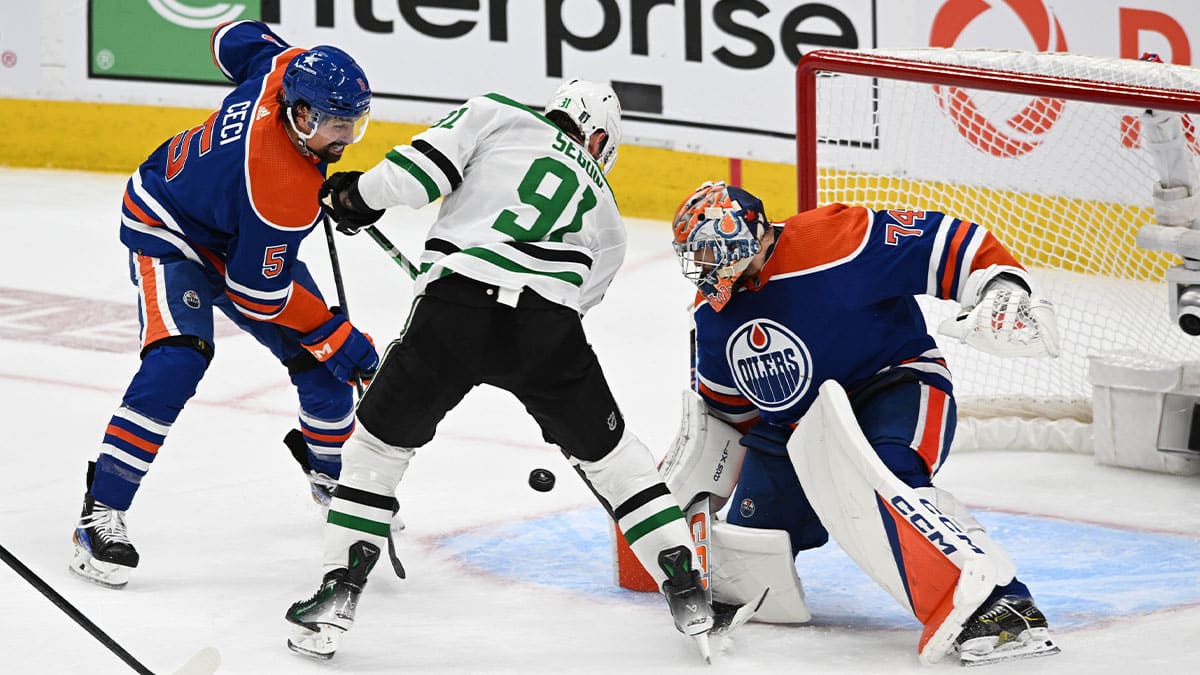 Edmonton Oilers defenceman Cody Ceci (5) battles for the puck with the Dallas Stars centre Tyler Seguin (91) in front of Oilers goalie Stuart Skinner (74) during the second period in game six of the Western Conference Final of the 2024 Stanley Cup Playoffs at Rogers Place.