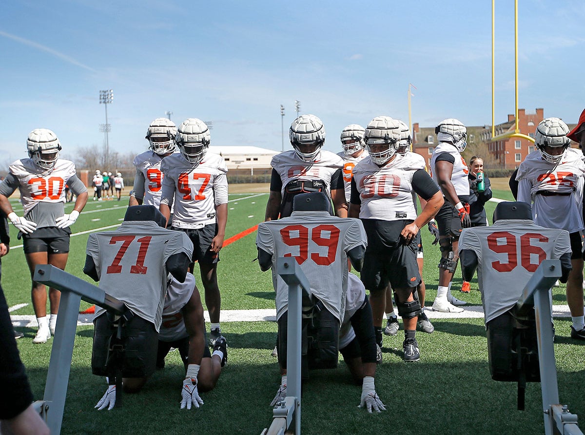 Oklahoma State defense goes through drills during an Oklahoma State University Cowboys spring football practice in Stillwater, Okla., 