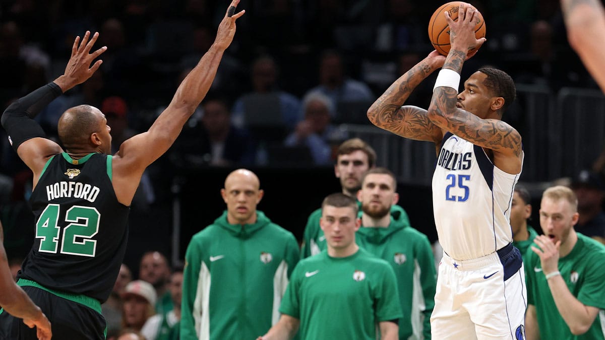 Dallas Mavericks forward P.J. Washington (25) shoots the ball against the Boston Celtics during the third quarter in game two of the 2024 NBA Finals at TD Garden.