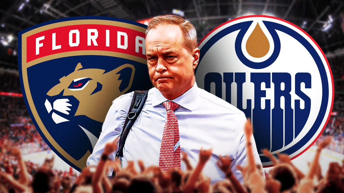 Panthers' Paul Maurice stands next to Oilers logo, Stanley Cup Finals reporters in background