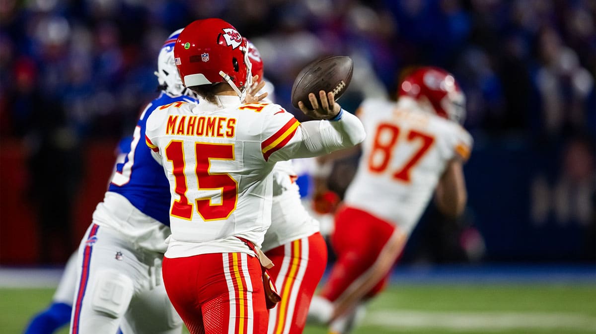 Patrick Mahomes with Travis Kelce in the background