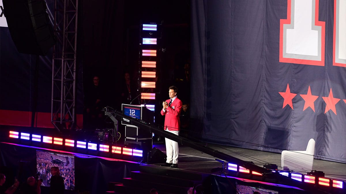 Former quarterback Tom Brady speaks during his New England Patriots Hall of Fame induction ceremony at Gillette Stadium.
