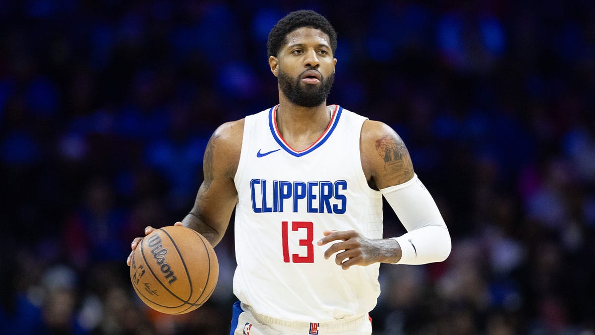 LA Clippers forward Paul George (13) dribbles the ball against the Philadelphia 76ers during the fourth quarter at Wells Fargo Center.