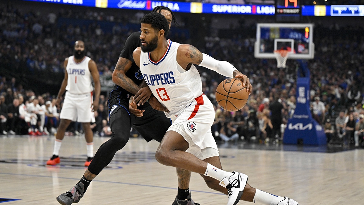 LA Clippers forward Paul George (13) drives to the basket against the Dallas Mavericks during the first quarter during game six of the first round for the 2024 NBA playoffs at American Airlines Center. 