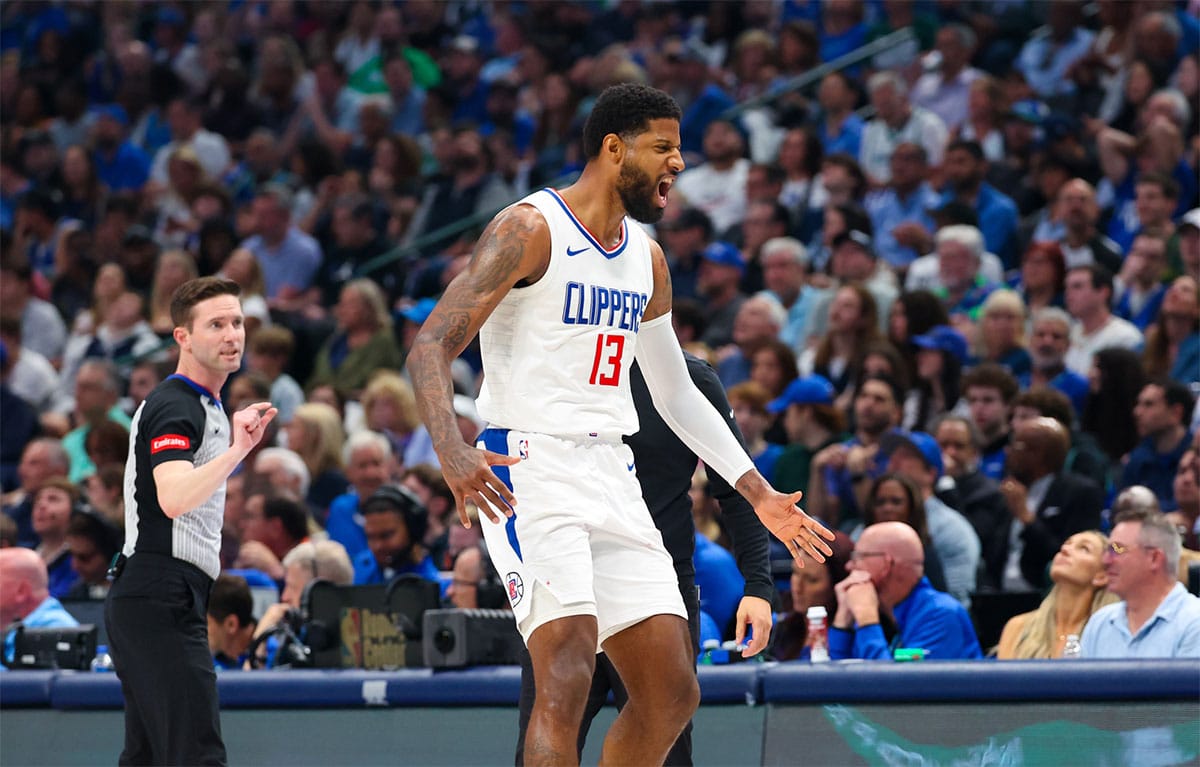 LA Clippers forward Paul George (13) reacts after scoring during the first quarter against the Dallas Mavericks during game four of the first round for the 2024 NBA playoffs at American Airlines Center.