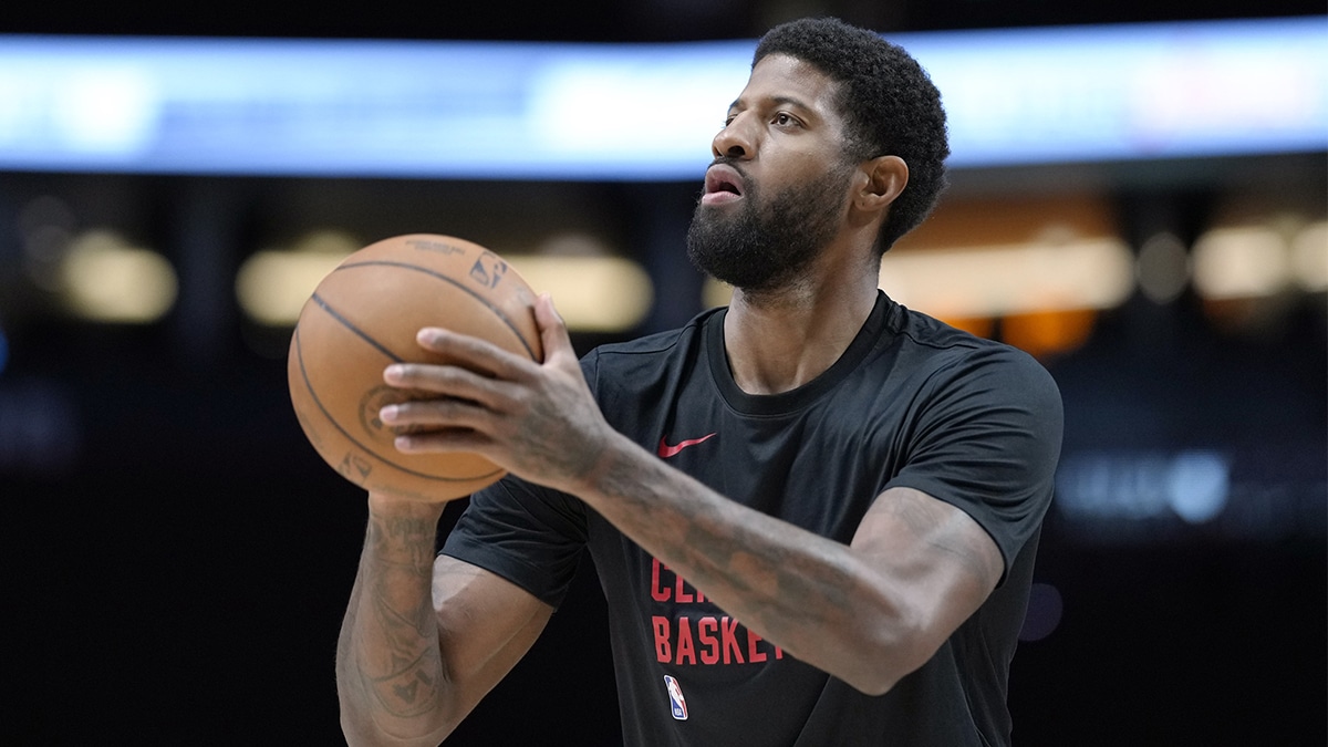 LA Clippers forward Paul George (13) warms up prior to a game against the Portland Trail Blazers at Moda Center. 