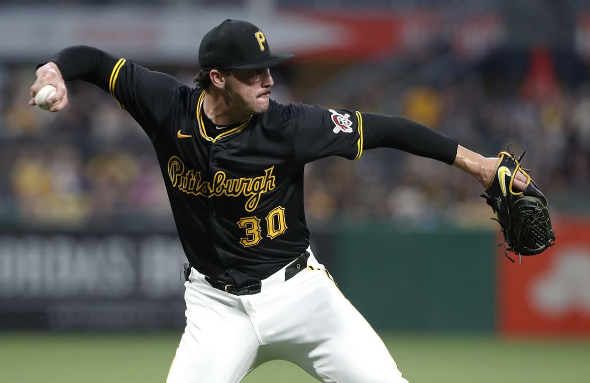 Pittsburgh Pirates starting pitcher Paul Skenes (30) throws to first base to retire Cincinnati Reds catcher Tyler Stephenson (not pictured) to end the sixth inning at PNC Park.