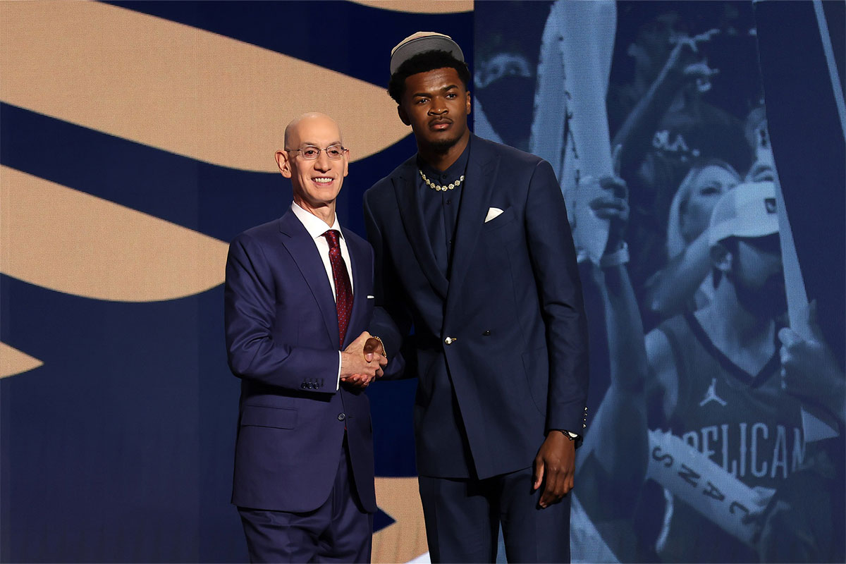 Yves Missi poses for photos with NBA commissioner Adam Silver after being selected in the first round by the New Orleans Pelicans in the 2024 NBA Draft at Barclays Center.