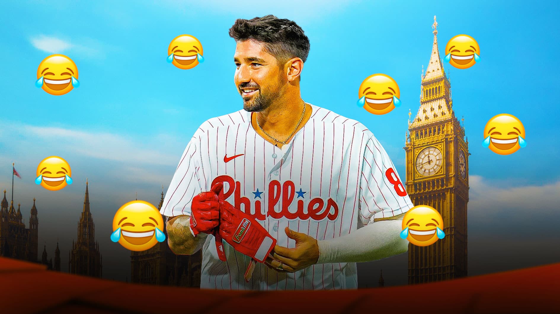 Photo: Nick Castellanos laughing in Phillies jerseys, laughing emojis all around him, Big Ben in London behind him
