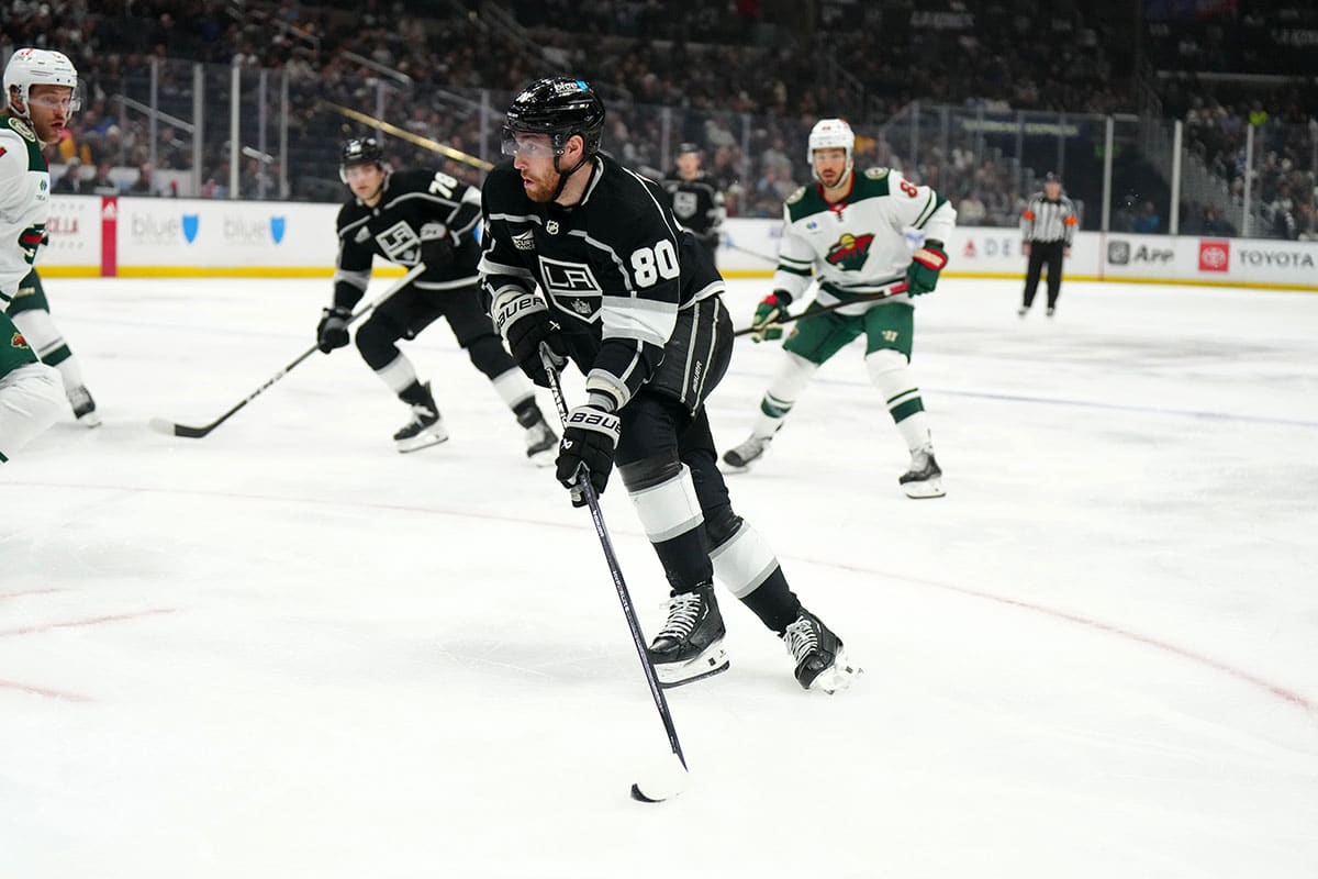LA Kings center Pierre-Luc Dubois (80) skates with the puck against the Minnesota Wild in the second period at Crypto.com Arena.