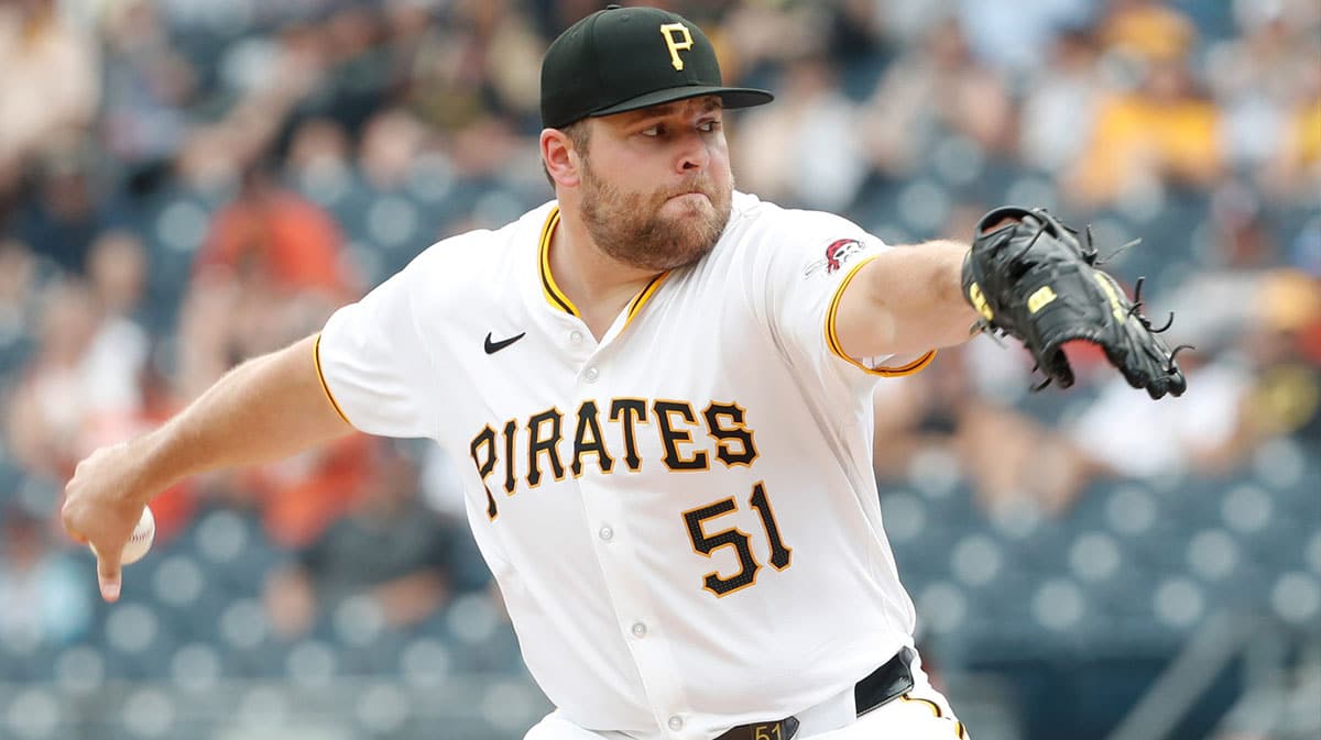 Pittsburgh Pirates relief pitcher David Bednar (51) pitches against the Cincinnati Reds during the ninth inning at PNC Park.