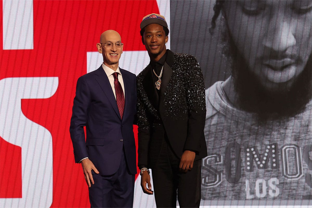 Ron Holland II poses for photos with NBA commissioner Adam Silver after being selected in the first round by the Detroit Pistons in the 2024 NBA Draft at Barclays Center. 