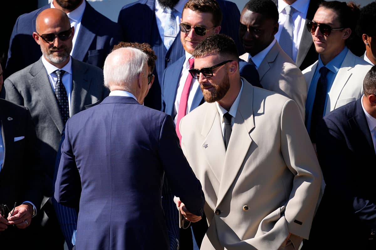 President Joe Biden and Travis Kelce during Kansas City Chiefs White House visit.