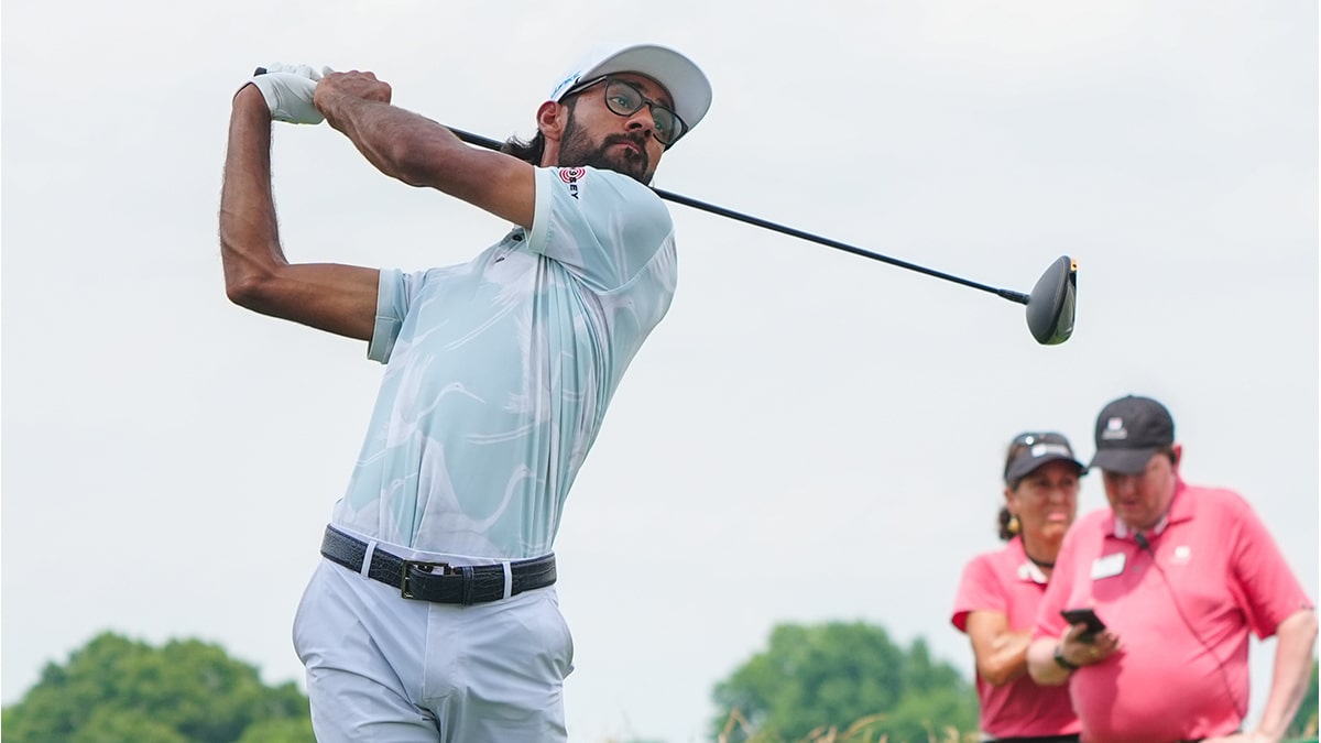 onnecticut, USA; Akshay Bhatia tees off on the third hole during the third round of the Travelers Championship golf tournament at TPC River Highlands. 