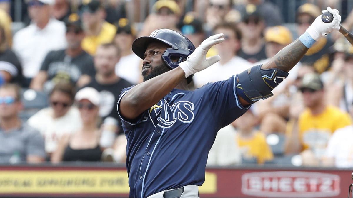 Tampa Bay Rays left fielder Randy Arozarena (56) drives in a run