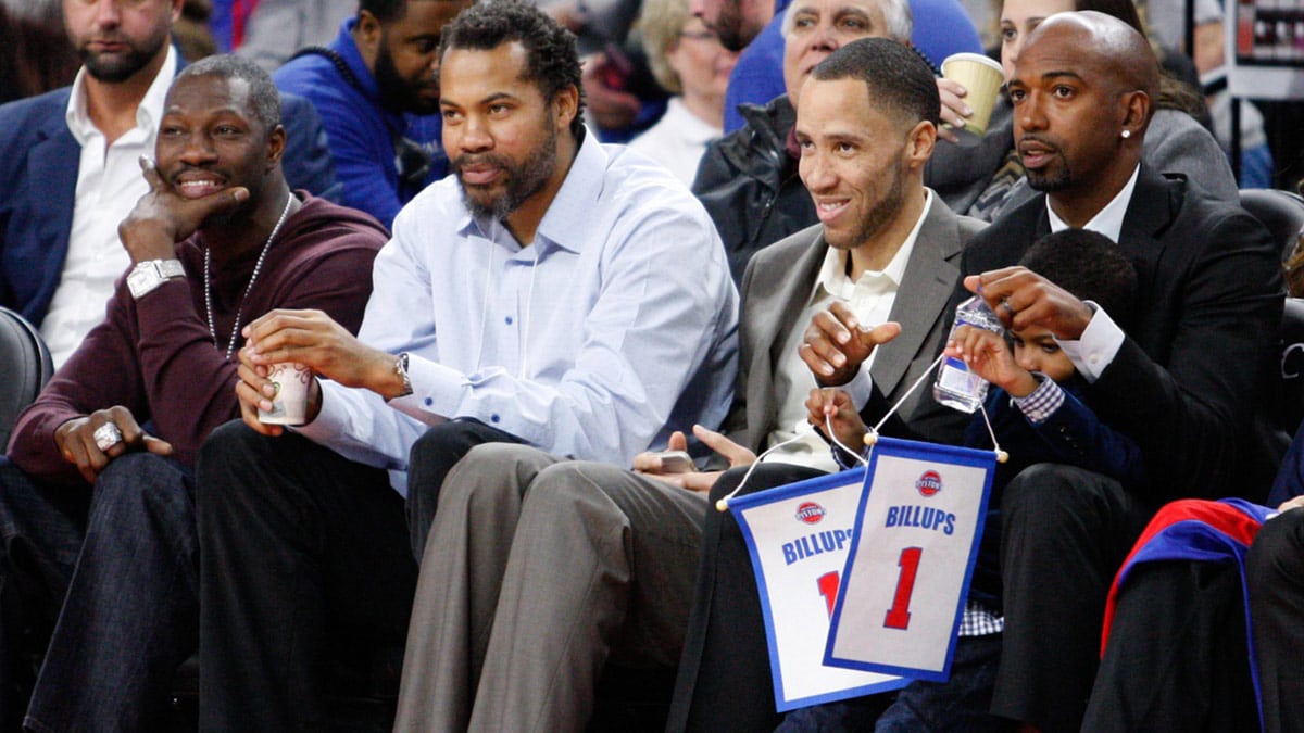 Former teammates (left to right) Ben Wallace and Rasheed Wallace and Tayshaun Prince and Richard Hamilton smile and look on during the second quarter in the game between the Detroit Pistons and the Denver Nuggets at The Palace of Auburn Hills. Nuggets win 103-92.