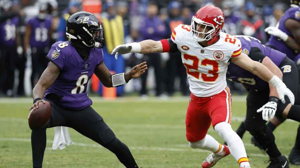Kansas City Chiefs linebacker Drue Tranquill (23) chases Baltimore Ravens quarterback Lamar Jackson (8) in the AFC Championship football game at M&T Bank Stadium. 