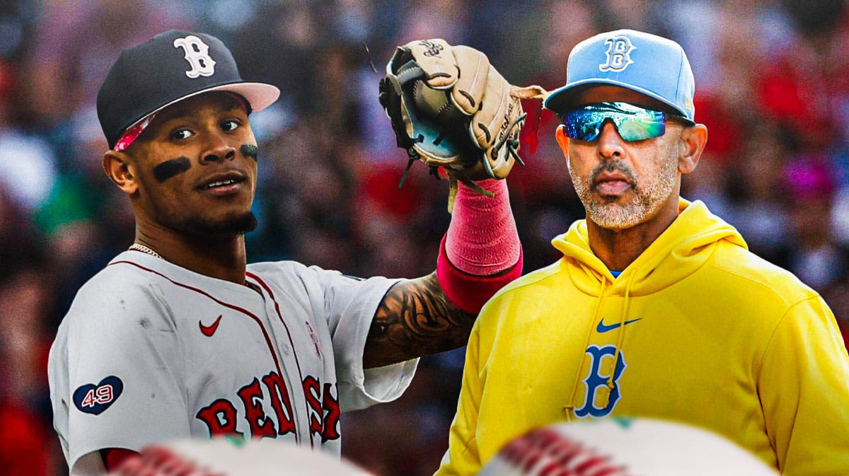 Boston Red Sox star Ceddane Rafaela and manager Alex Cora in front of Fenway Park.