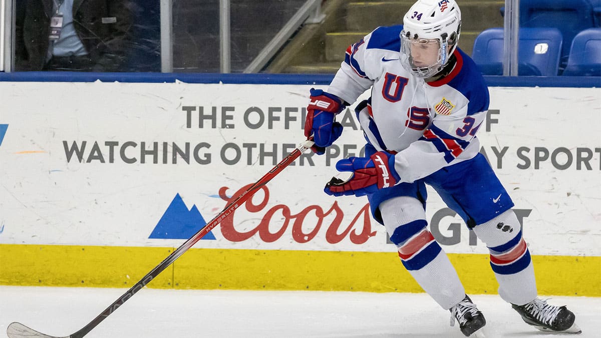 USA s Cole Eiserman (34) controls the puck against Finland during the third period of the 2024 U18 s Five Nations Tournament at USA Hockey Arena.