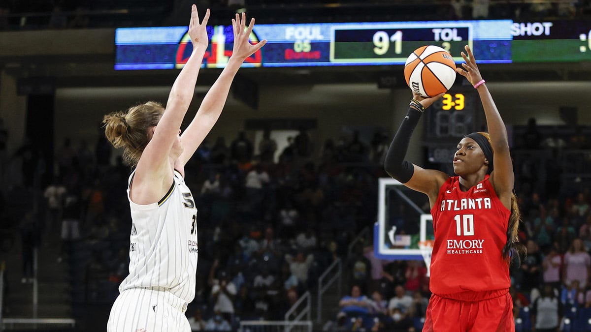 Atlanta Dream guard Rhyne Howard (10) shoots against Chicago Sky forward Emma Meesseman (33) during the second half of a WNBA game.