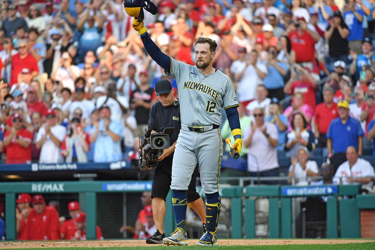 Milwaukee Brewers first base Rhys Hoskins (12) acknowledges the crowd on his return to Philadelphia before his at bat during the second inning against the Philadelphia Phillies at Citizens Bank Park.