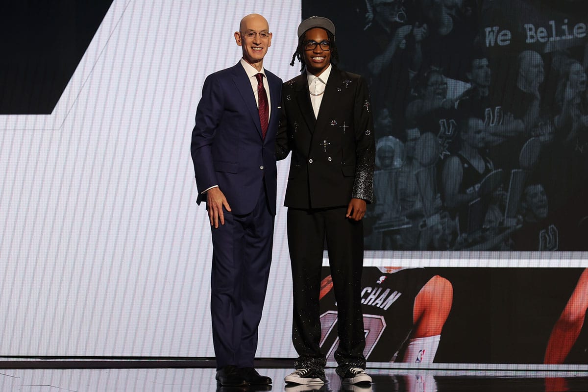Rob Dillingham with Adam Silver after being drafted