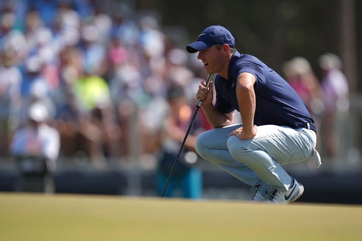 Rory McIlroy lines up a putt on the third hole during the third round of the U.S. Open golf tournament. Mandatory Credit: Jim Dedmon-USA TODAY Sports