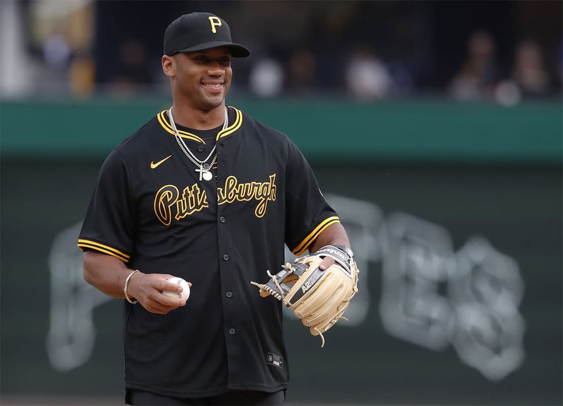 Pittsburgh Steelers quarterback Russell Wilson (3) throws out a ceremonial first pitch before the Pittsburgh Pirates host the Boston Red Sox at PNC Park.
