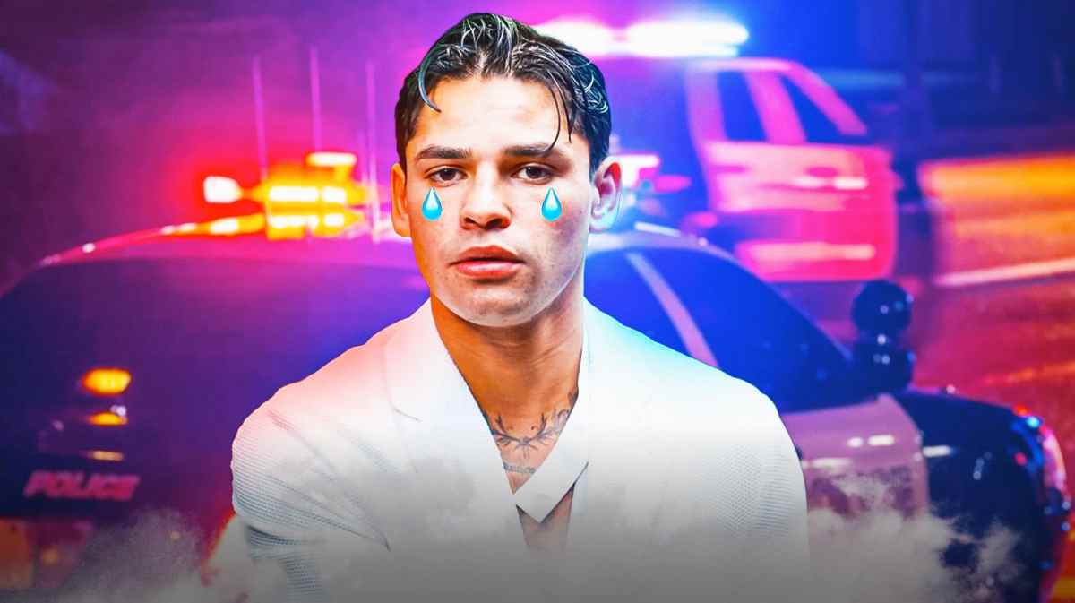 Ryan Garcia with animated tears. Police car in the background