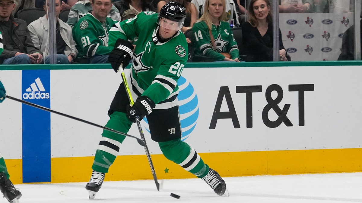 Dallas Stars defenseman Ryan Suter (20) takes a shot on goal against the San Jose Sharks during the second period at American Airlines Center
