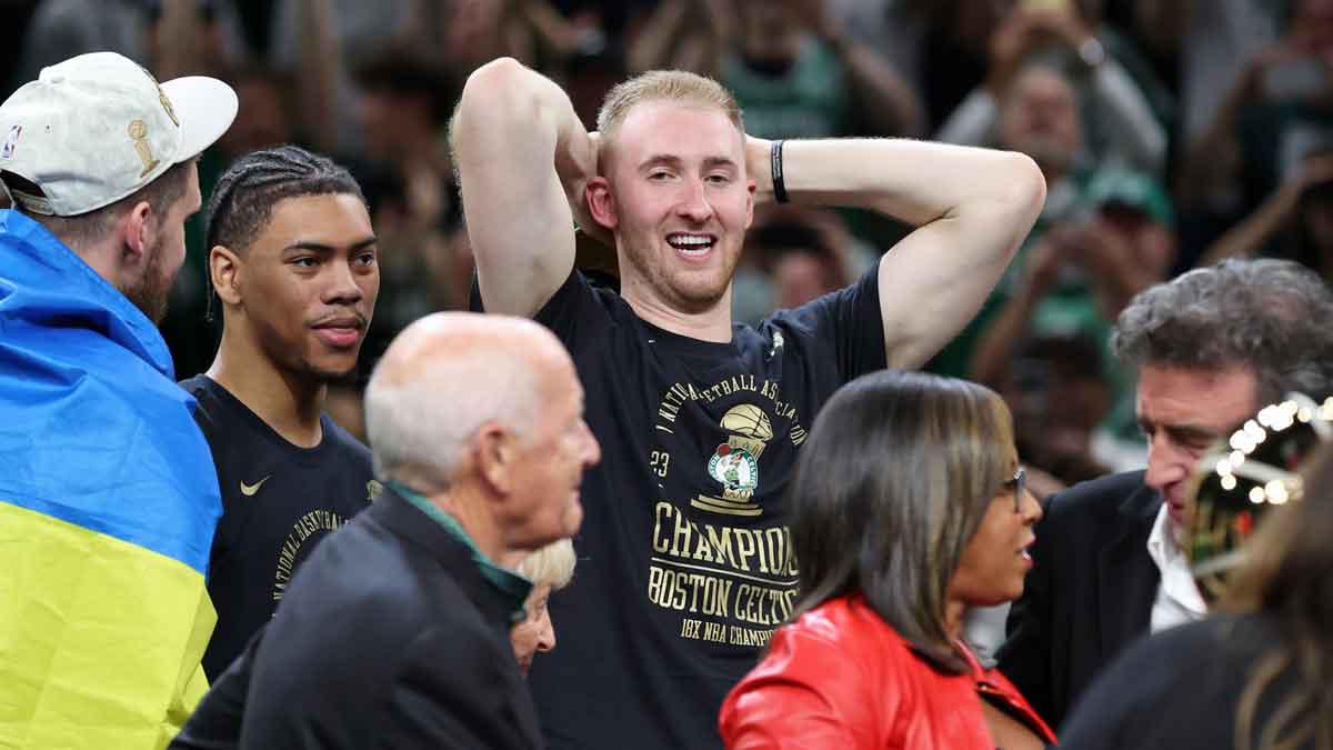 Boston Celtics forward Sam Hauser (30) celebrates after winning the 2024 NBA Finals against the Dallas Mavericks at TD Garden.