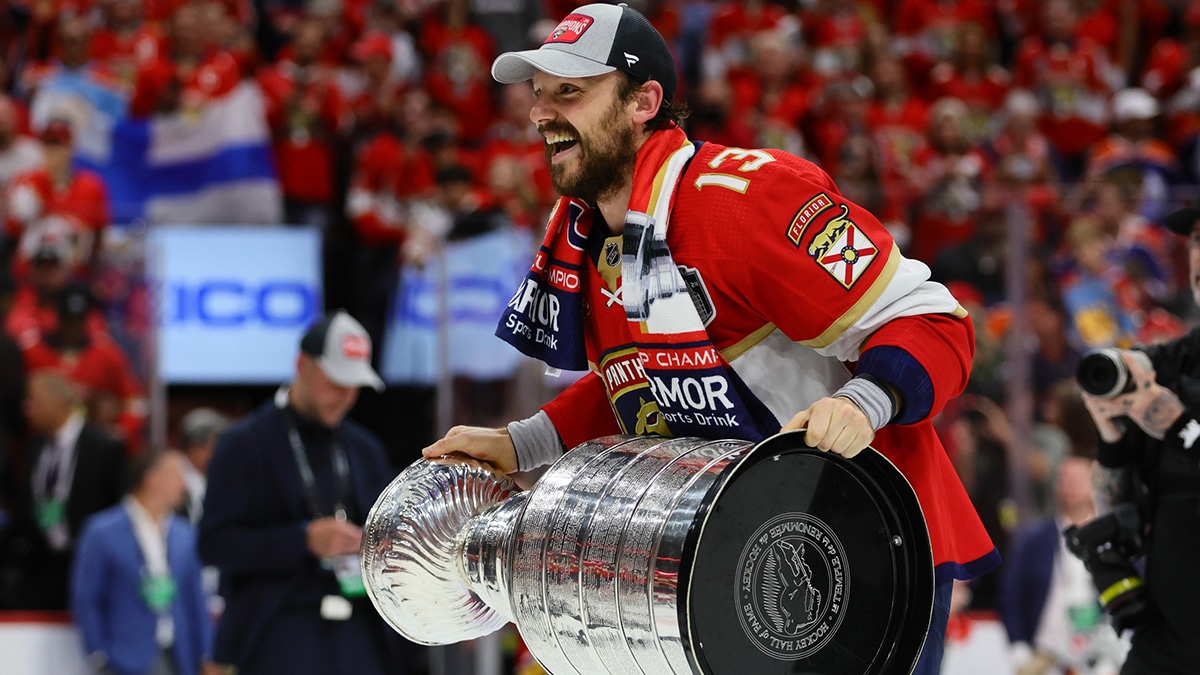Florida Panthers center Sam Reinhart (13) skates with the cup after winning game seven of the 2024 Stanley Cup Final against the Edmonton Oilers at Amerant Bank Arena.