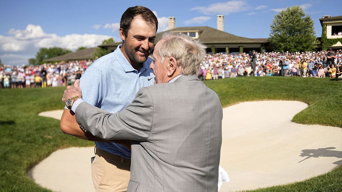 Scottie Scheffler (left) reacts with retired golfer Jack Nicklaus (right) winning the Memorial Tournament at Muirfield Village Golf Club.