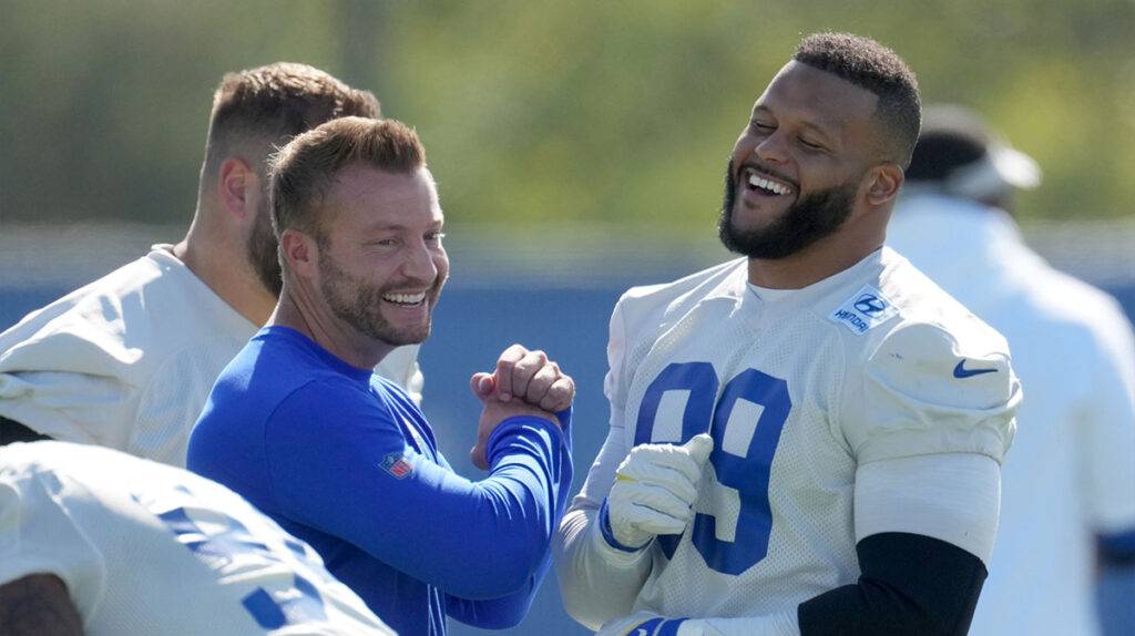 Los Angeles Rams defensive end Aaron Donald (99) and coach Sean McVay react during minicamp at Cal Lutheran University. 
