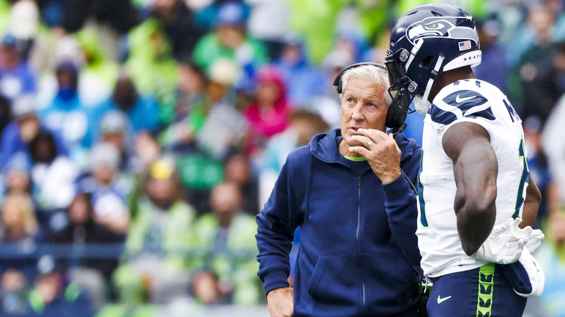 Sep 24, 2023; Seattle, Washington, USA; Seattle Seahawks head coach Pete Carroll talks with wide receiver DK Metcalf (14) during a third quarter timeout against the Carolina Panthers at Lumen Field. Mandatory Credit: Joe Nicholson-USA TODAY Sports