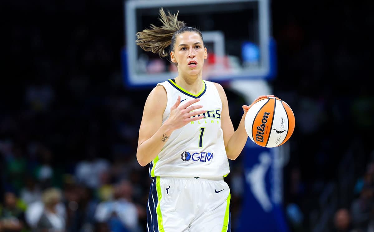 Dallas Wings guard Sevgi Uzun (1) dribbles during the first quarter against the Chicago Sky at College Park Center.