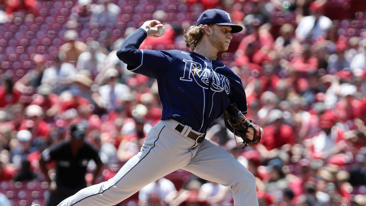  Tampa Bay Rays starting pitcher Shane Baz (11) throws a pitch against the Cincinnati Reds during the first inning at Great American Ball Park.