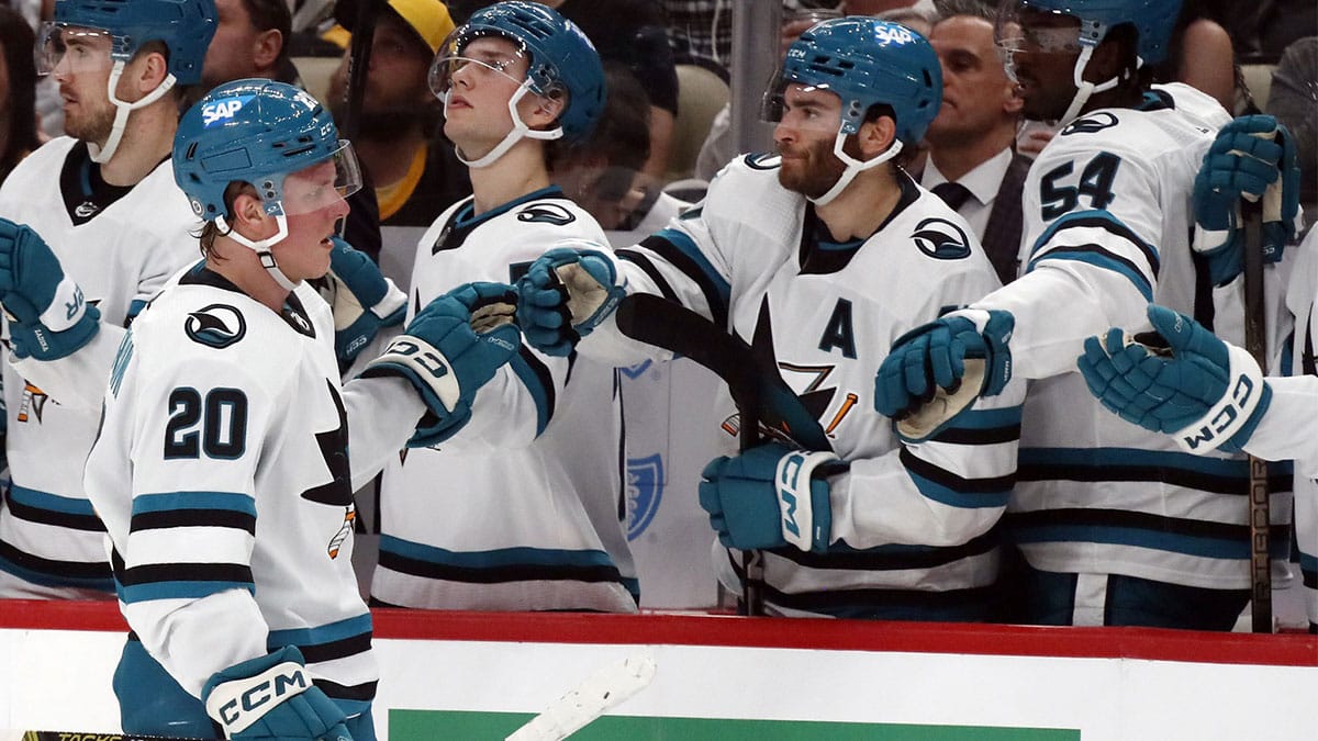 San Jose Sharks left wing Fabian Zetterlund (20) celebrates with the Sharks bench after scoring a goal against the Pittsburgh Penguins during the first period at PPG Paints Arena.