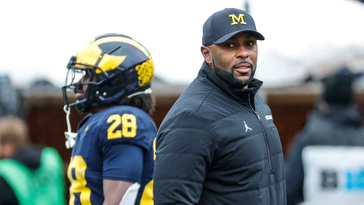 Michigan head coach Sherrone Moore watches a play during the second half of the spring game at Michigan Stadium