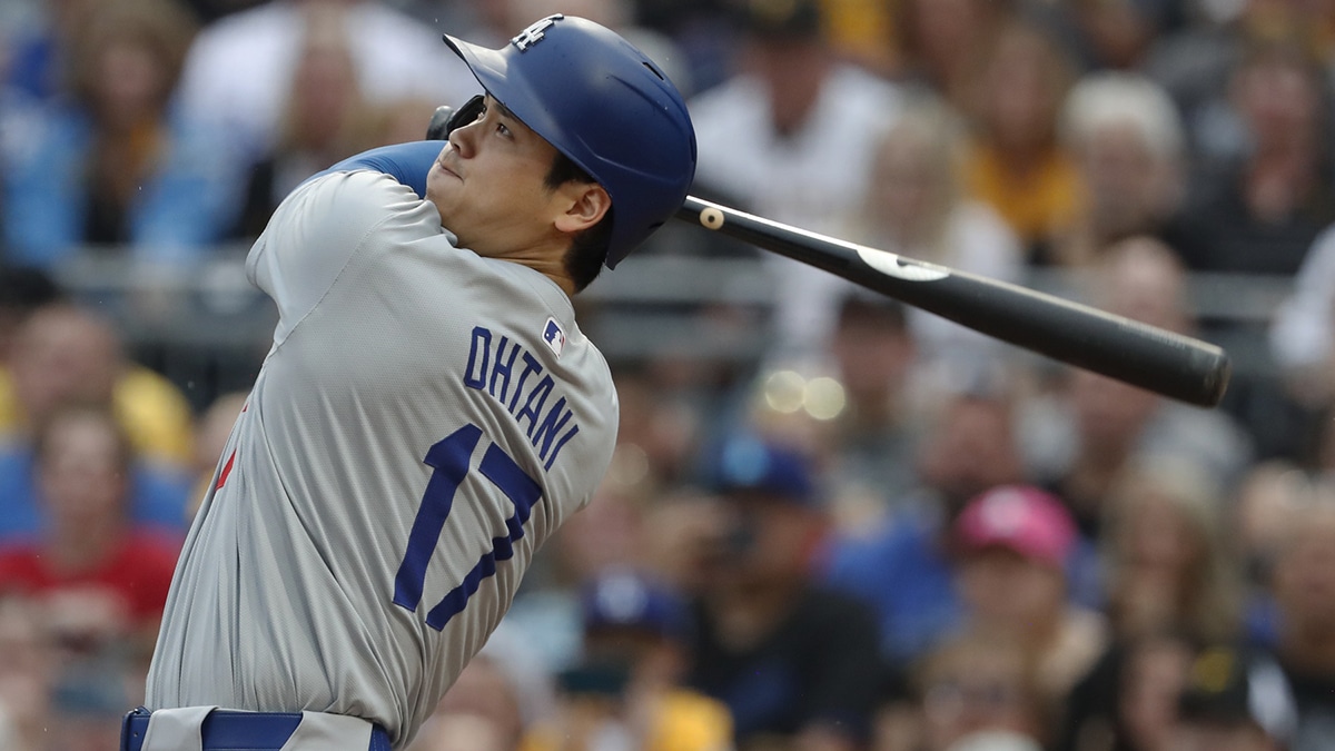 Los Angeles Dodgers designated hitter Shohei Ohtani (17) hits a two run home run against the Pittsburgh Pirates during the third inning at PNC Park