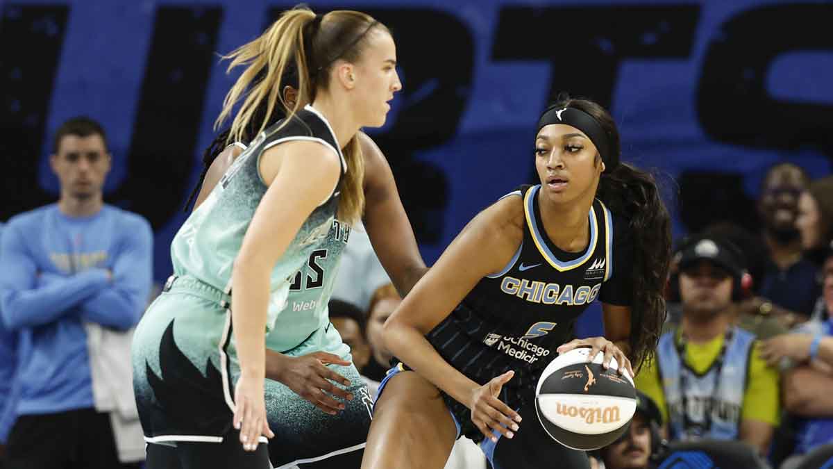 Sky forward Angel Reese (5) controls the ball against the New York Liberty
