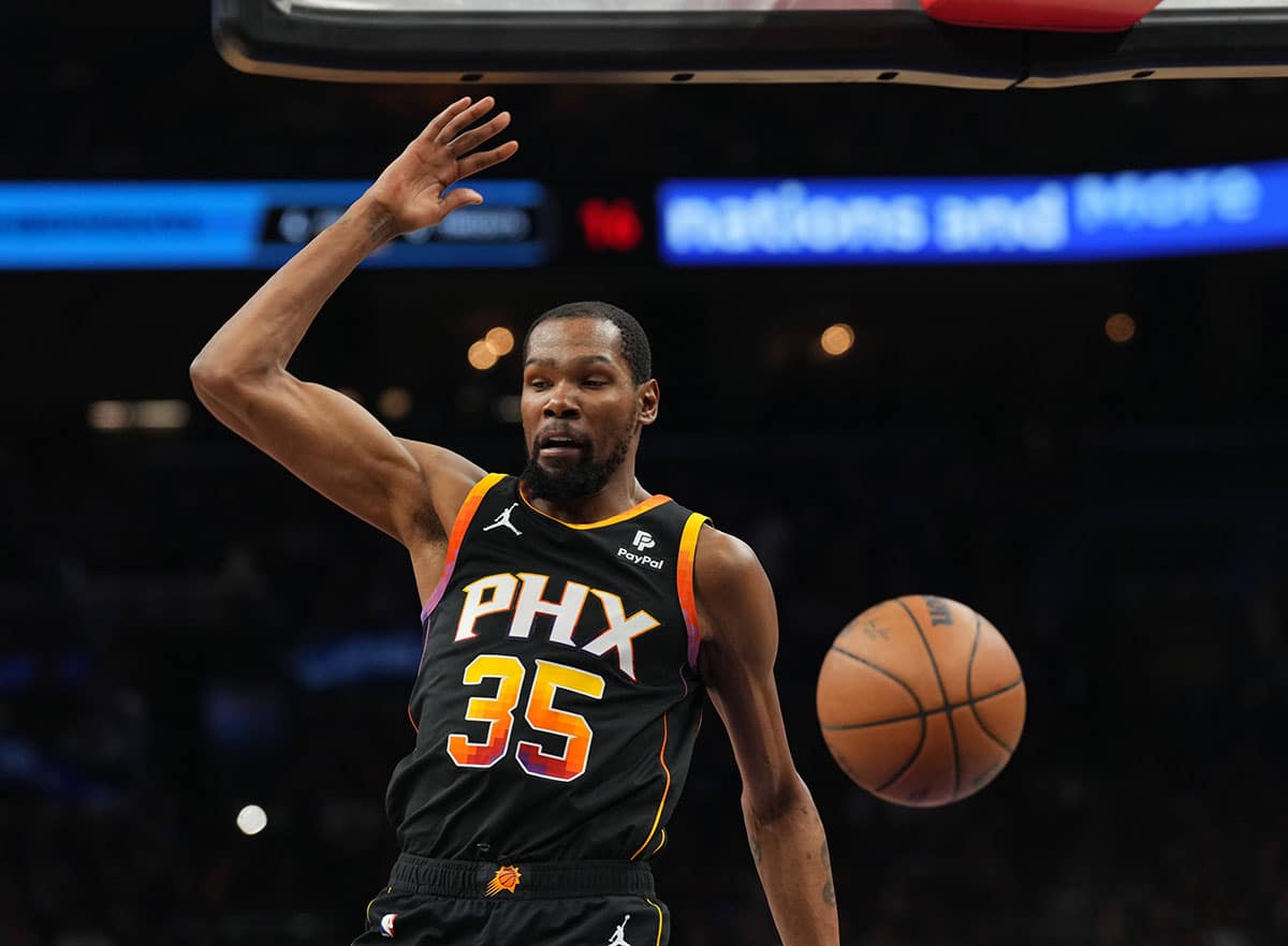 Phoenix Suns forward Kevin Durant (35) dunks against the Minnesota Timberwolves during the first half of game four of the first round for the 2024 NBA playoffs at Footprint Center.